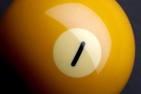 Macro shot of yellow pool ball with space for copyの写真素材