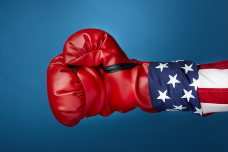 Close up shot of Uncle Sam wearing red boxing glove includes space for copyの写真素材