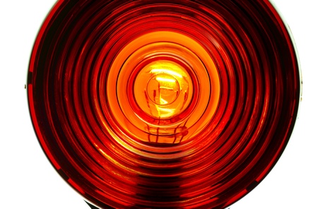 Extreme close up of lens from an illuminated red lightの写真素材