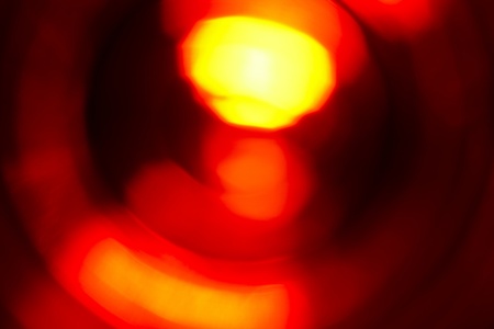 Macro background shot of glowing red light created in studioの写真素材