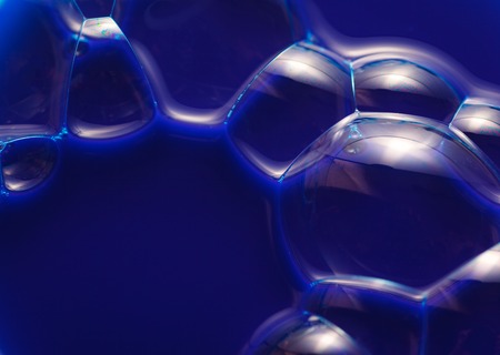 Water surface with blue bubbles abstract background
