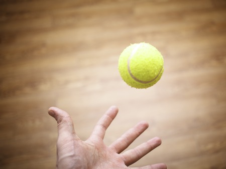 Mens Arm with Ball Tennisの写真素材