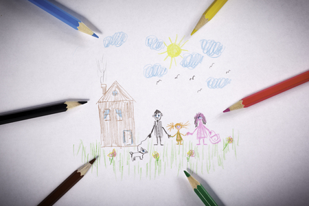 Child's drawing with pencils - happy familyの写真素材