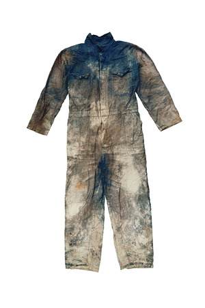 Heavily worn out and spoiled construction working overall isolated on a white background with a clipping path.の写真素材