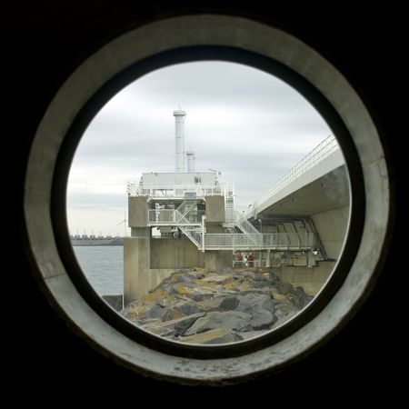 A through view on the storm flood barrier through one of the windows of the visitors' centre