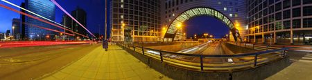 a 360 degrees panoramic image of a roundabout on top of a motorway. A big downtown junction