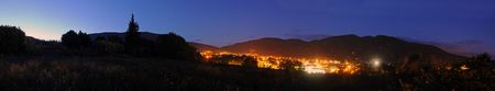 A panoramic image of the town of Nyons, Drome en Provence, in France at nightの写真素材