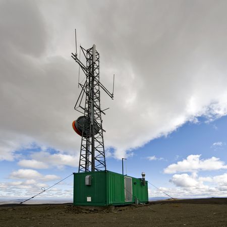 An all weather communications tower in the geographical center of Iceland, build on top of a dormant shield volcano, the Fjordungsaldaの写真素材