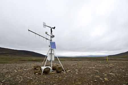 A solar powered weather station and transmitting aerial along the Kjolur Highland route in the Tundras of Iceland on a typical Icelandic overcast day.の写真素材