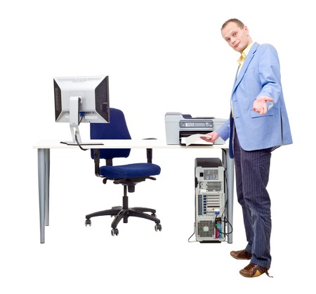 A man demonstrating how easy it is to print professional documents by taking a sheet of paper out of...