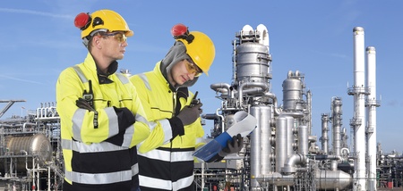 Two industrial guards checking the safety around the site, の写真素材