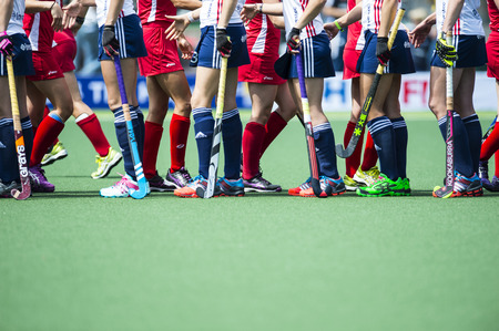 THE HAGUE, NETHERLANDS - JUNE 1: Team USA and Team England shaking hands after the matc during the Hockey World Cup 2014 in the match between USA and England (women) USA beats ENG 2-1のeditorial素材