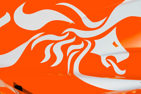 ASSEN, NETHERLANDS - OCTOBER 19, 2014: The colors and crest of the Dutch flag of Britain painted on the body work of a rformula FA1 ace carのeditorial素材