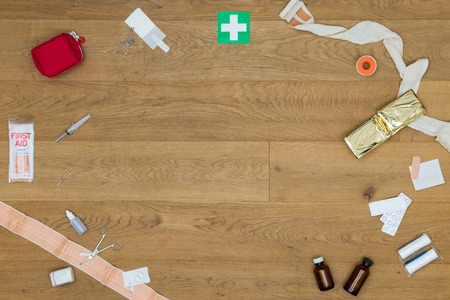 Directly above shot of first aid medical tools on wooden tableの写真素材