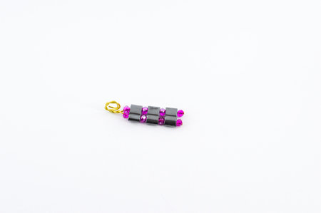 Pendants made with beads and crystals of various colors.