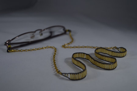 eyeglass chains decorated with beads and crystals of various shapes and colorsの写真素材