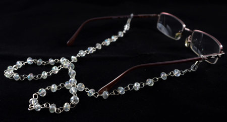 Necklace made for eyeglasses chain, sunglasses chain, adorned with beads and crystals.の写真素材