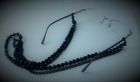 Necklace made for eyeglasses chain, sunglasses chain, adorned with beads and crystals.の写真素材