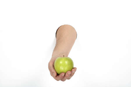 green apple in handの写真素材