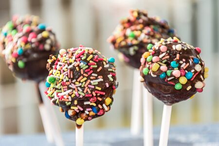 Homemade cake pops with chocolate and sugar sprinkles