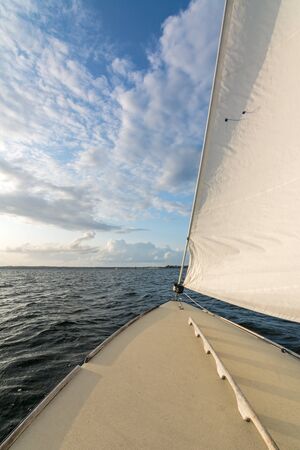 Sailing boat sailing in the late afternoon light