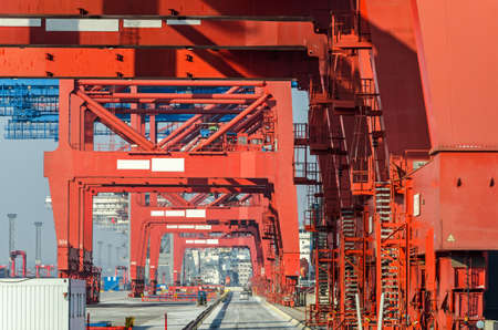 Closeup shot of gantry cranes at a container terminal in the harbor in Hamburg, Germany