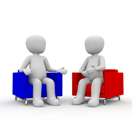 Two people talk to each other about an interesting topic.の写真素材