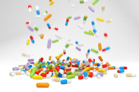 Falling colorful pills - 3D rendered imageの写真素材