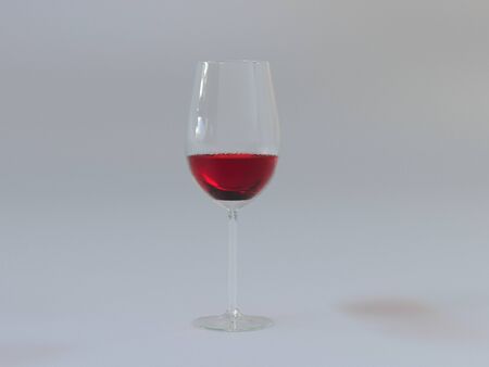 glass with transparent wine on a white backgroundの写真素材