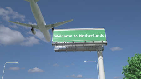 Arriving plane flies over WELCOME TO NETHERLANDS road sign 3d renderingの写真素材