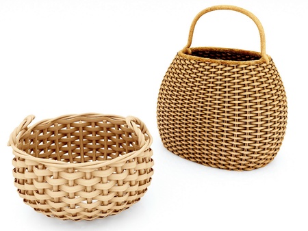 Empty wicker baskets isolated on whiteの写真素材