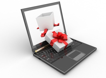 Laptop and open box of gift on white backgroundの写真素材