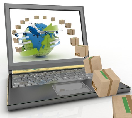 Cardboard boxes, globe on a laptop screen and airplane. Concept of online goods orders worldwideの写真素材