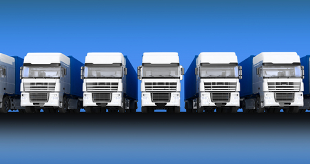 Trucks with semi-trailer isolated on blue sky backgroundの写真素材