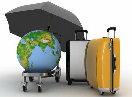 Transportation of earth and suitcases on a freight light cart under the umbrella.の写真素材