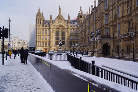 London, UK: a view of the Palace of Westminster on a snowy dayのeditorial素材
