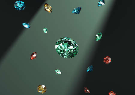 Colorful diamond gems falling on deep green background 3d renderingの写真素材