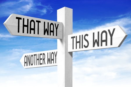 This way - wooden signpostの写真素材