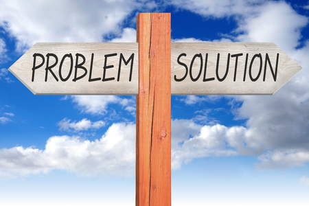 Problem or solution - wooden signpostの写真素材