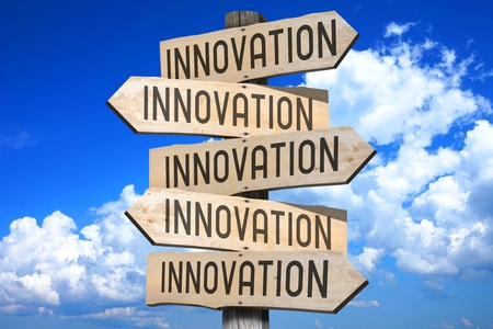 Wooden signpost - innovation