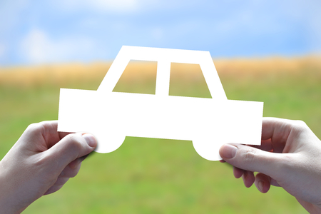 Car insurance concept, hands, papercutの写真素材