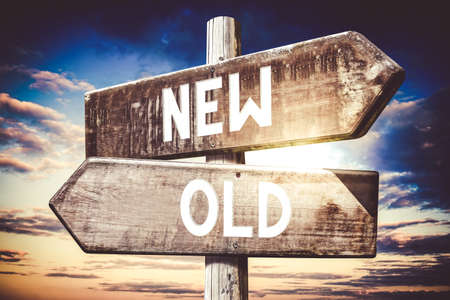 New, old - wooden signpost, roadsign with two arrows