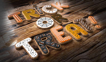 Trick or treat! - Halloween cookies on wooden background - 3D illustrationの写真素材