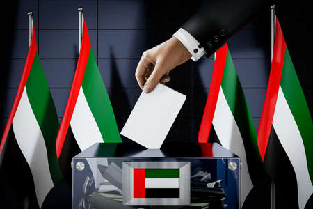 United Arab Emirates flags, hand dropping ballot card into a box - voting, election concept - 3D illustrationの写真素材
