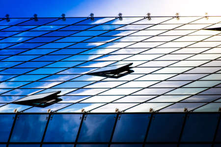 Modern glass office building - close-up - business conceptの写真素材