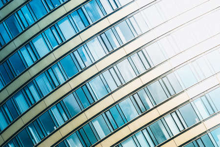 Round modern glass office building - business conceptの写真素材