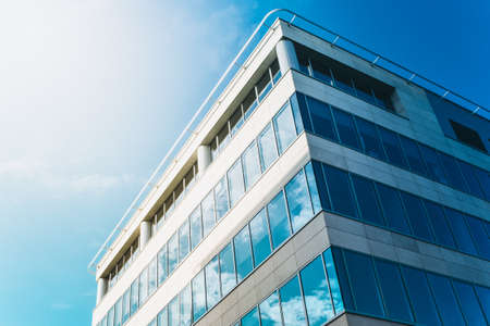 Modern glass office building - close-up - business conceptの写真素材