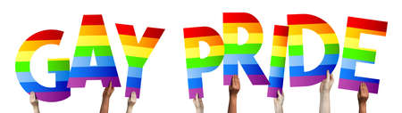 Gay pride banner - human hands holding colorful lettersの写真素材