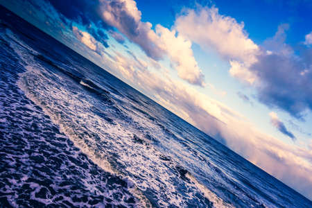 Baltic Sea waves, cloudy skyの写真素材