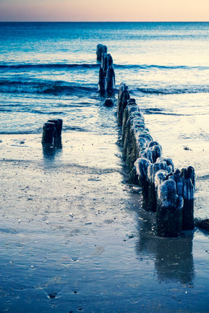 Old groyne on a shoreの写真素材